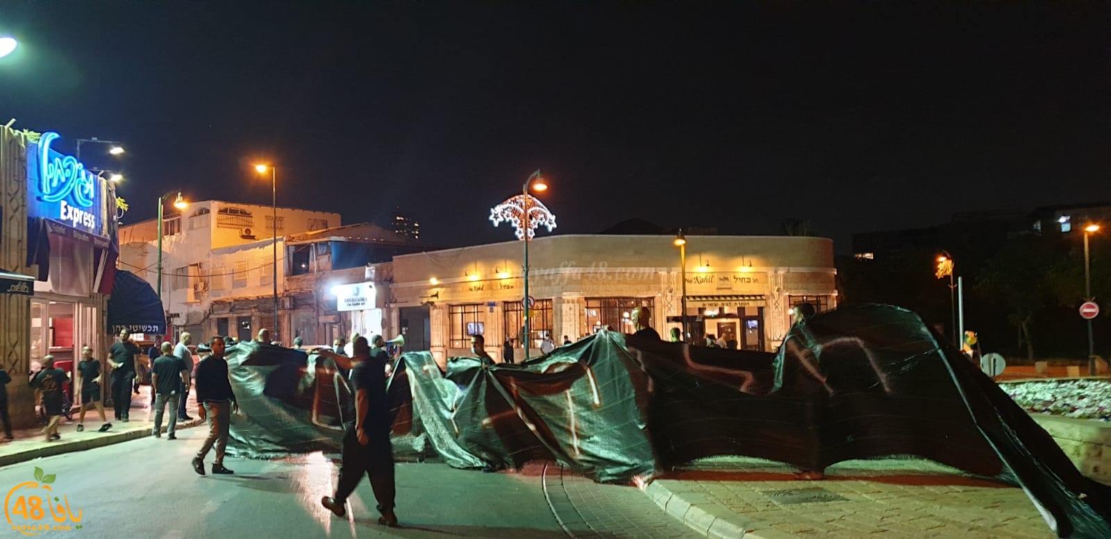 فيديو: تجدد الاحتجاجات في دوار الساعة بيافا تنديداً بنبش مقبرة الاسعاف